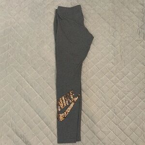 Nike Leggings, Size Medium, gray with rose gold check on back of leg
